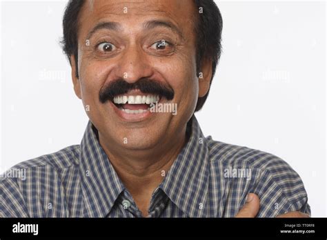 Portrait Of An Indian Mature Man Smiling Stock Photo Alamy