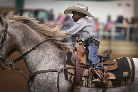 Cowboys And Cowgirls Compete In Countrys Only Touring Black Rodeo