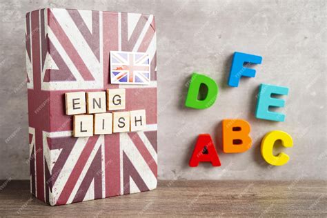 Premium Photo | English book with graduate hat learning and tutorial ...