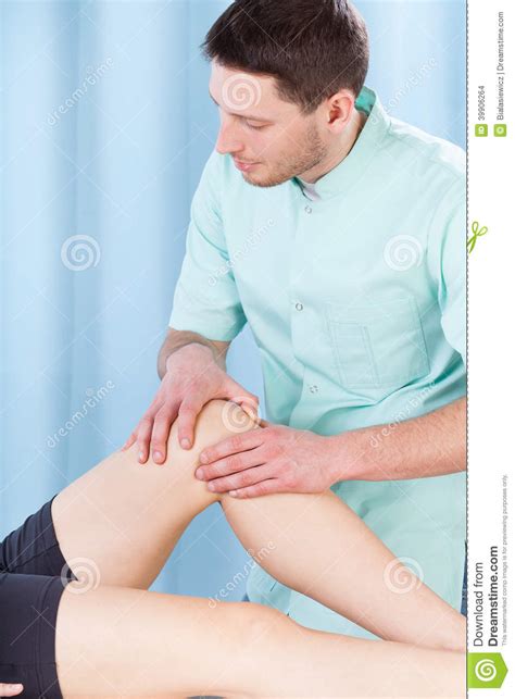 Physiotherapist Massaging A Woman Lumbar Physiotherapy And Osteopathy