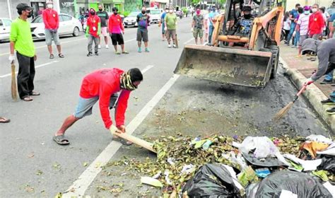 residents engage  bayanihan  clear cebu city  debris inquirer