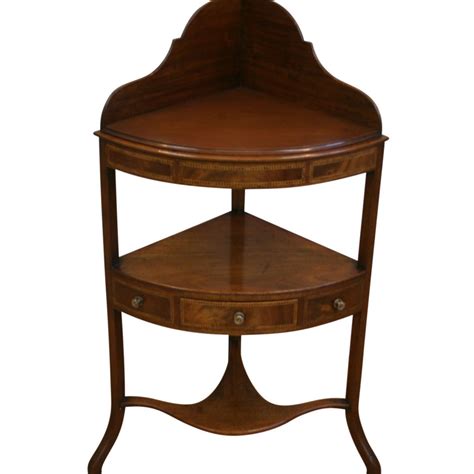 A Georgian Oval Mahogany And Satinwood And Ebony Strung Toilet Mirror