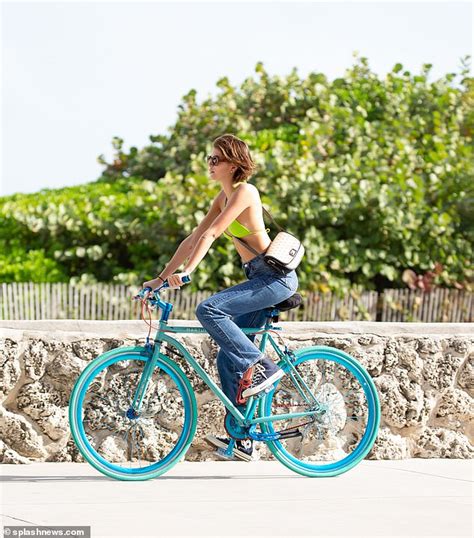 Kaia Gerber Wears Lime Bikini Top While Biking In Miami With Pals Daily Mail Online