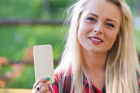Blonde Girl Showing A Mobile Phone Stock Photo Image Of Nature Nice 55676418