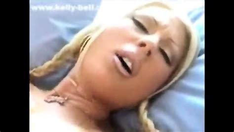 Kelly Bell Strips And Rubs Her Bald Pussy