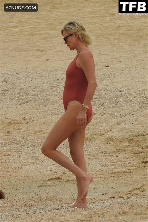 Charlize Theron Sets Pulses Racing In A Red Hot One Piece Swimsuit Aznude