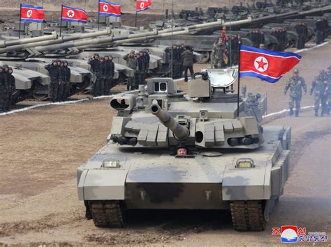 Kim Jong Un Drives New North Korean Tank As He Plays Soldier In Mock Battle