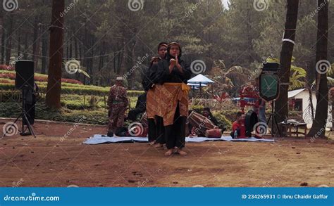 A Group Of Teens Enter The Stage And Line Up To Show Their Martial Art