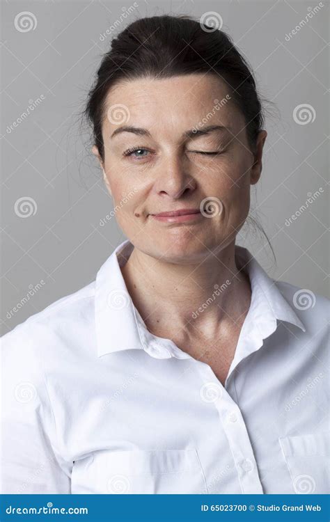 Beautiful 40s Woman Winking For Seduction With Serenity Stock Photo Image Of Enjoying Mature