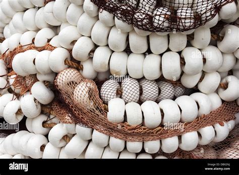Fishing Corks On A Fishing Net Stock Photo Alamy