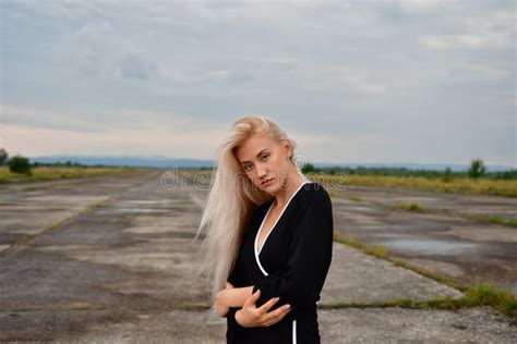 Blonde In A Mini Skirt On Runway Stock Photo Image Of Blond Path