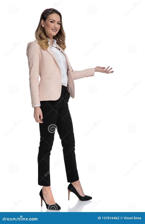 Young Businesswoman in High Heels Presents To Side Stock Photo - Image ...