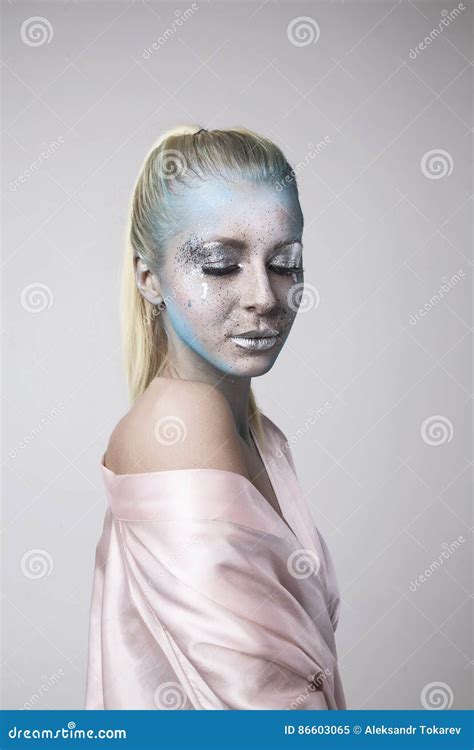 Beautiful Blonde Girl With Bodyart On Face Isolated Stock Image Image Of Blue Studio
