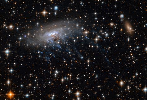 Hubble Views Spiral Galaxy ESO 137-001