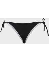 Calvin Klein Synthetic Logo Tape String Bikini Bottom Lyst Canada