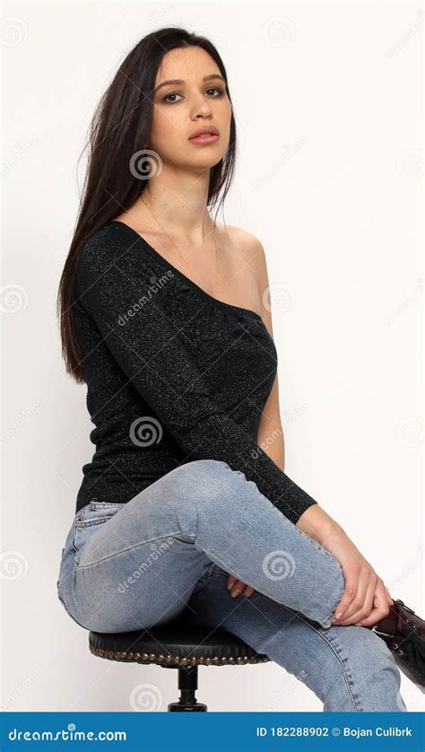 Beautiful Stylish Brunette Female Model Posing In Studio On Isolated Background Style