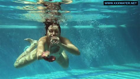 Kittina Submerges Herself In To The Hot Pool