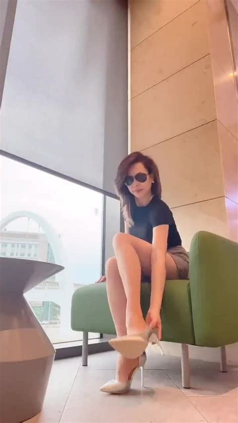 Long Legged Redheaded Asian MILF Trying On Sexy High Heels Feet9