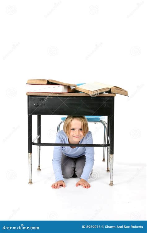 Young Girl Hiding Under A School Desk Stock Photo Image Of Education