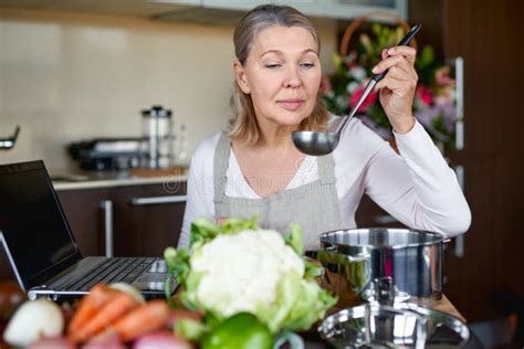 Mature Woman In Kitchen Preparing Food Stock Image Image Of Leisure Fresh