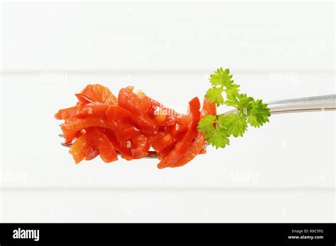 pickled red peppers Stock Photo - Alamy