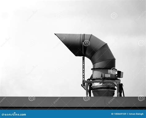Large Gooseneck Mechanical Vent Pipe On Roof Top In Monochrome Stock