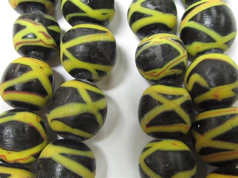 Indonesian Glass Beads Matte Black With Yellow And Red Bead World Online Shop