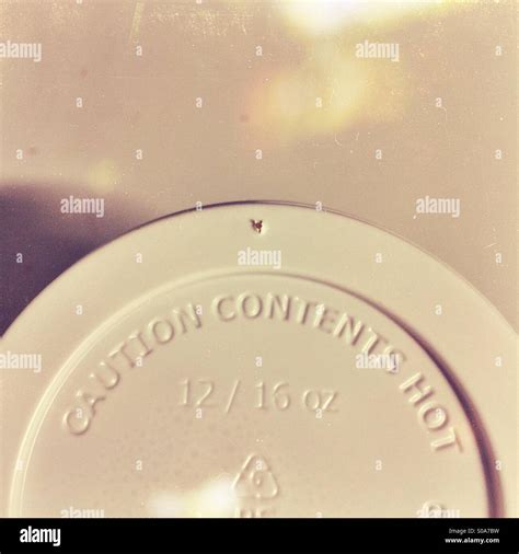 Caution Contents Hot Wording On The Plastic Lid Of A Takeaway Coffee