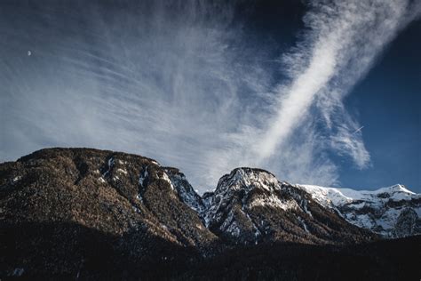 Free Images Nature Rock Snow Winter Cloud Sky Sunlight