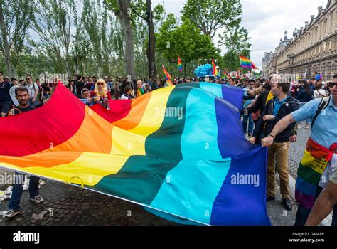 Paris France Crowd People Holding Gay Rainbow Flag At Gay Pride Lgbtq Activism Marching On