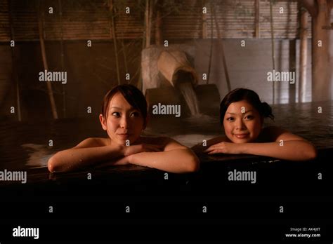 Two Women Relaxing In Hot Tub Stock Photo Alamy