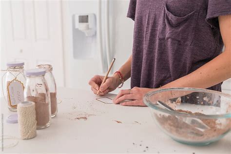 Preparing Homemade Hot Cocoa Mix As A Gift By Stocksy Contributor SKC Stocksy