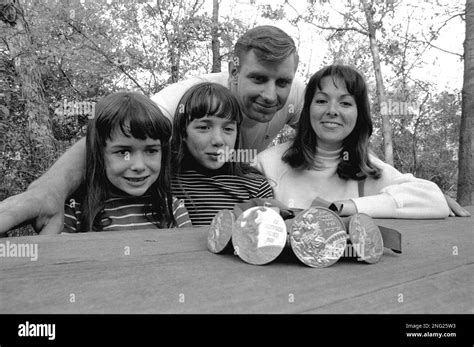 File Al Oerter Looks Over His Four Olympic Gold Medals With His