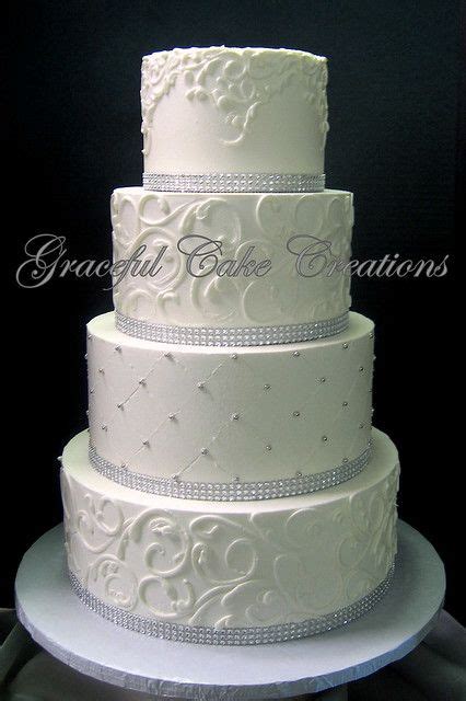 Elegant White Butter Cream Wedding Cake With Silver Sugar Pearls And