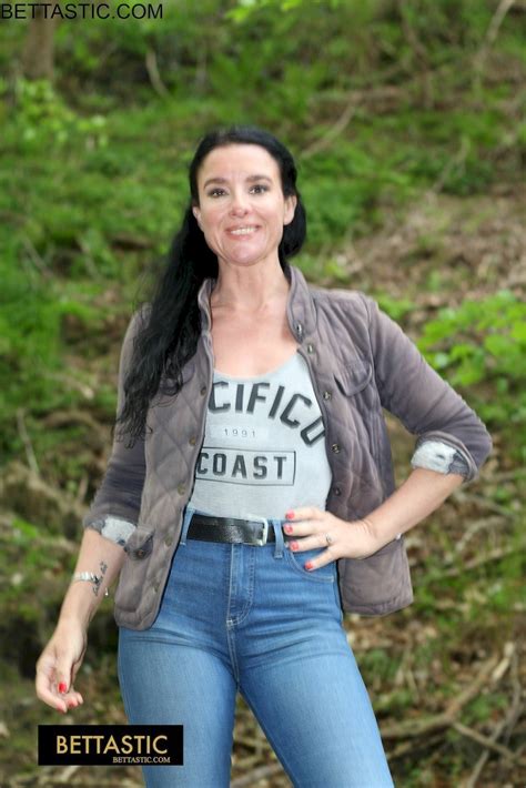 Hot Brunette Chick Takes Off Her Clothes While Posing Outdoors Photos