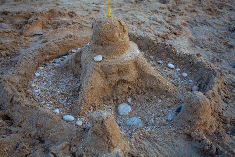 Sand Castle on the Beach. Kids Play with Sand. Castle Made of Sand on ...