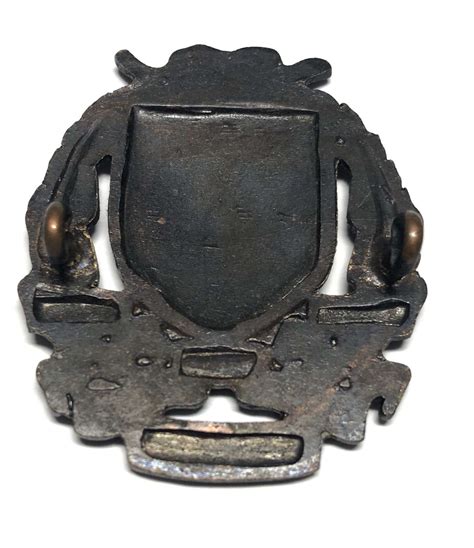 St. Edmund's School OTC, Ware cap badge