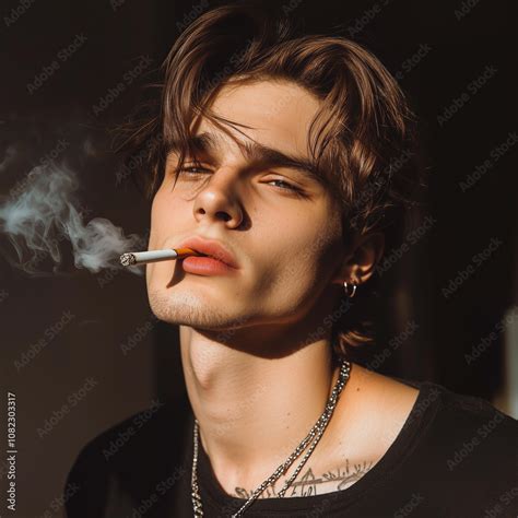 Portrait Of A Very Attractive Gay Male Model Smoking Guy Looking Cool While Smoking Smoking