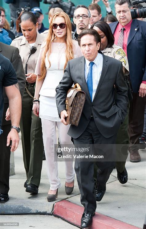 Lindsay Lohan And Her Lawyer Mark Heller Leave After Lohans Trial