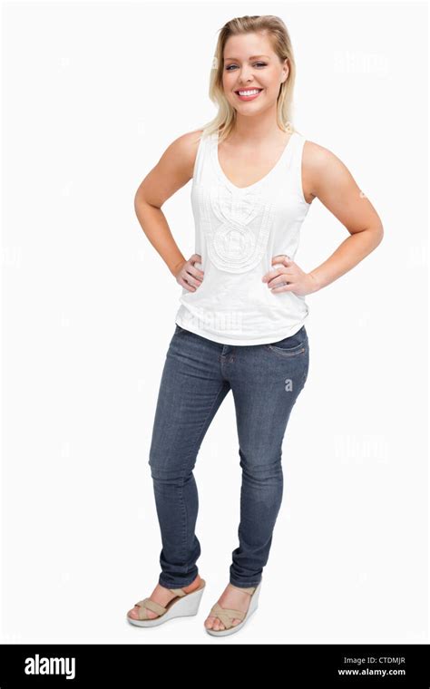 Smiling Blonde Woman Placing Her Hands On Her Hips Stock Photo Alamy