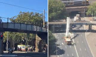 Sydney Woman Strips Naked And Clambers Up A Road Bridge Daily Mail Online