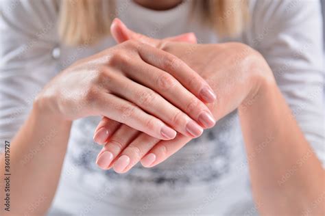 Girl Hands With Nude Natural Color Nails Polish In Beauty Studio Woman Hands With Beautiful