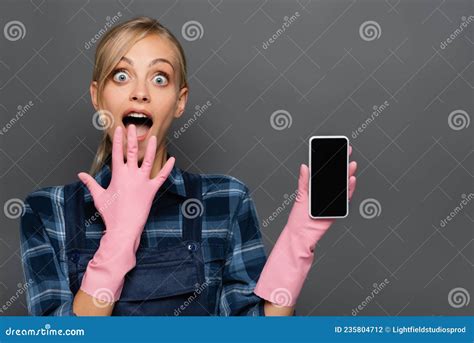 Astonished Blonde Plumber In Rubber Gloves Stock Photo Image Of Woman Attractive