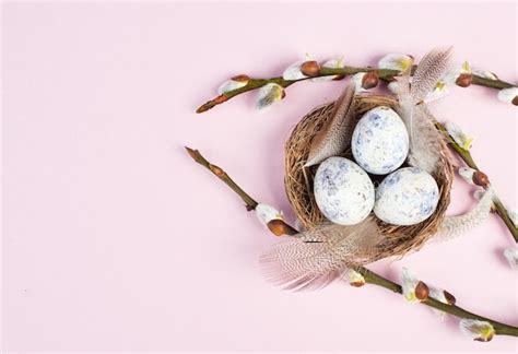 Premium Photo Easter Holiday Background Nest With Small Eggs Branches Of Pussy Willow