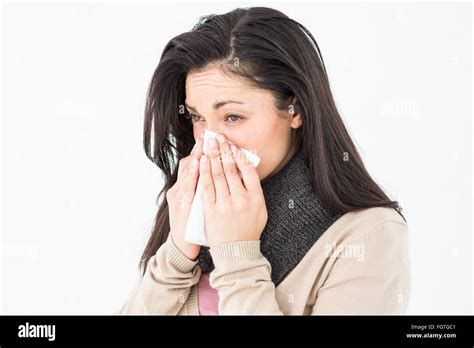 Sick Brunette Blowing Her Nose Stock Photo Alamy
