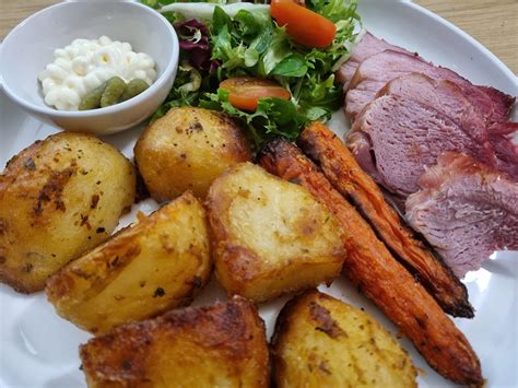 Roasted honey glazed gammon joint, potatoes, carrots and salad. Mayo ...