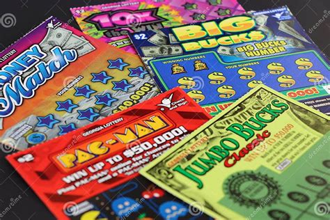 Close Up Of Various Georgia Lottery Scratchers Against Dark Background