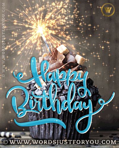 A Birthday Card With A Cupcake And Sparklers In The Background That