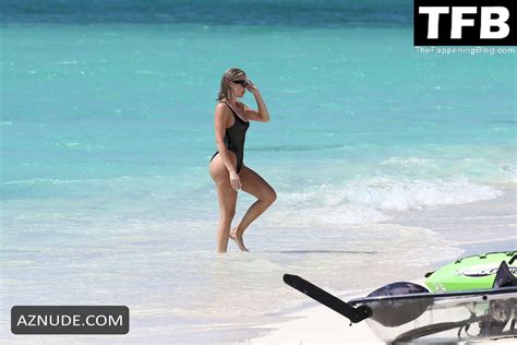 Khloe Kardashian Sexy Seen Showing Off Her Incredible Figure In A Black One Piece Bikini At The