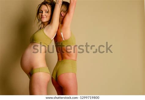 Two Girls Posing Photo Naked Dressed Stock Photo 1299719800 Shutterstock